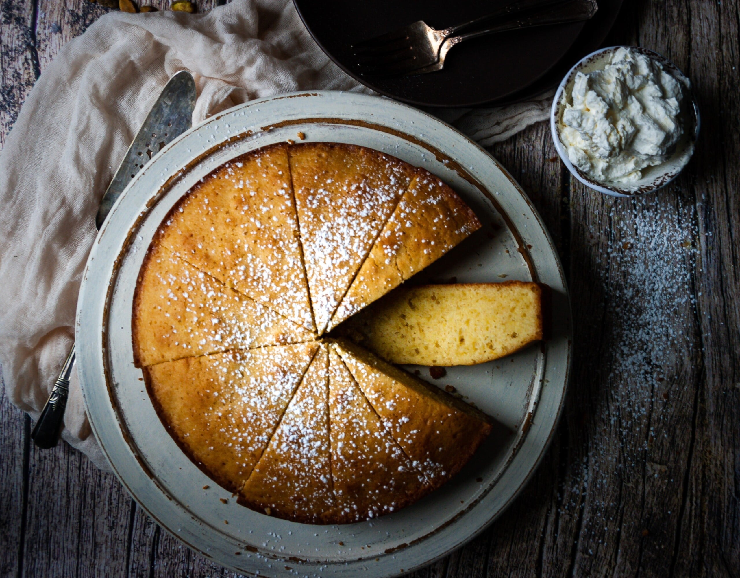 Simply dusted with a little powdered sugar, this olive oil cake is the perfect breakfast treat.