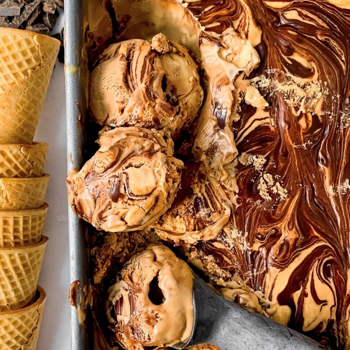 French-style, homemade peanut butter fudge swirl ice cream recipe being scooped