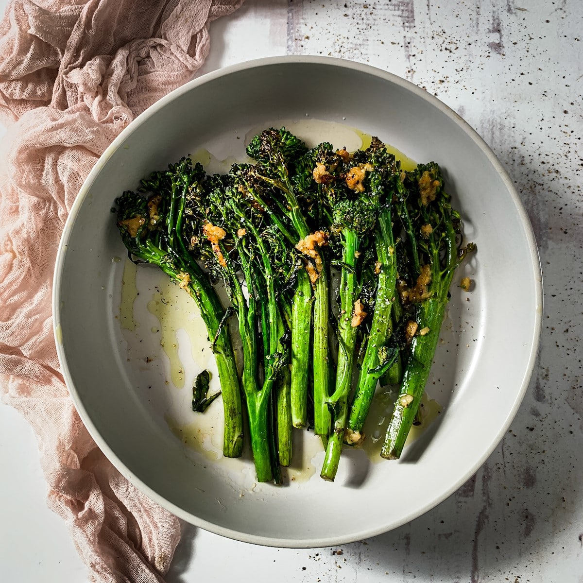 Roasted tenderstem broccoli on a serving plate