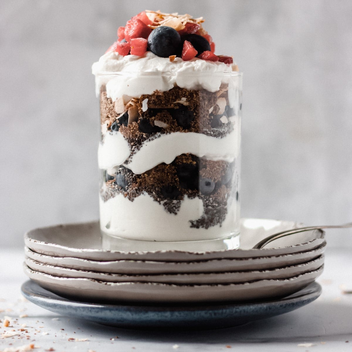 Front view of low carb yogurt parfait in a mason jar.
